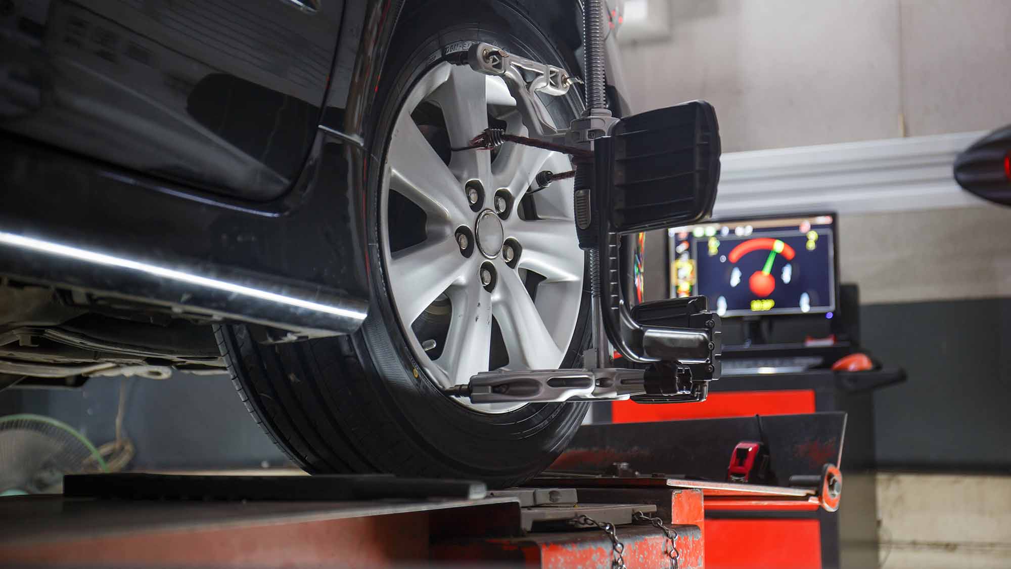 Tire alignment services tire alignment in process